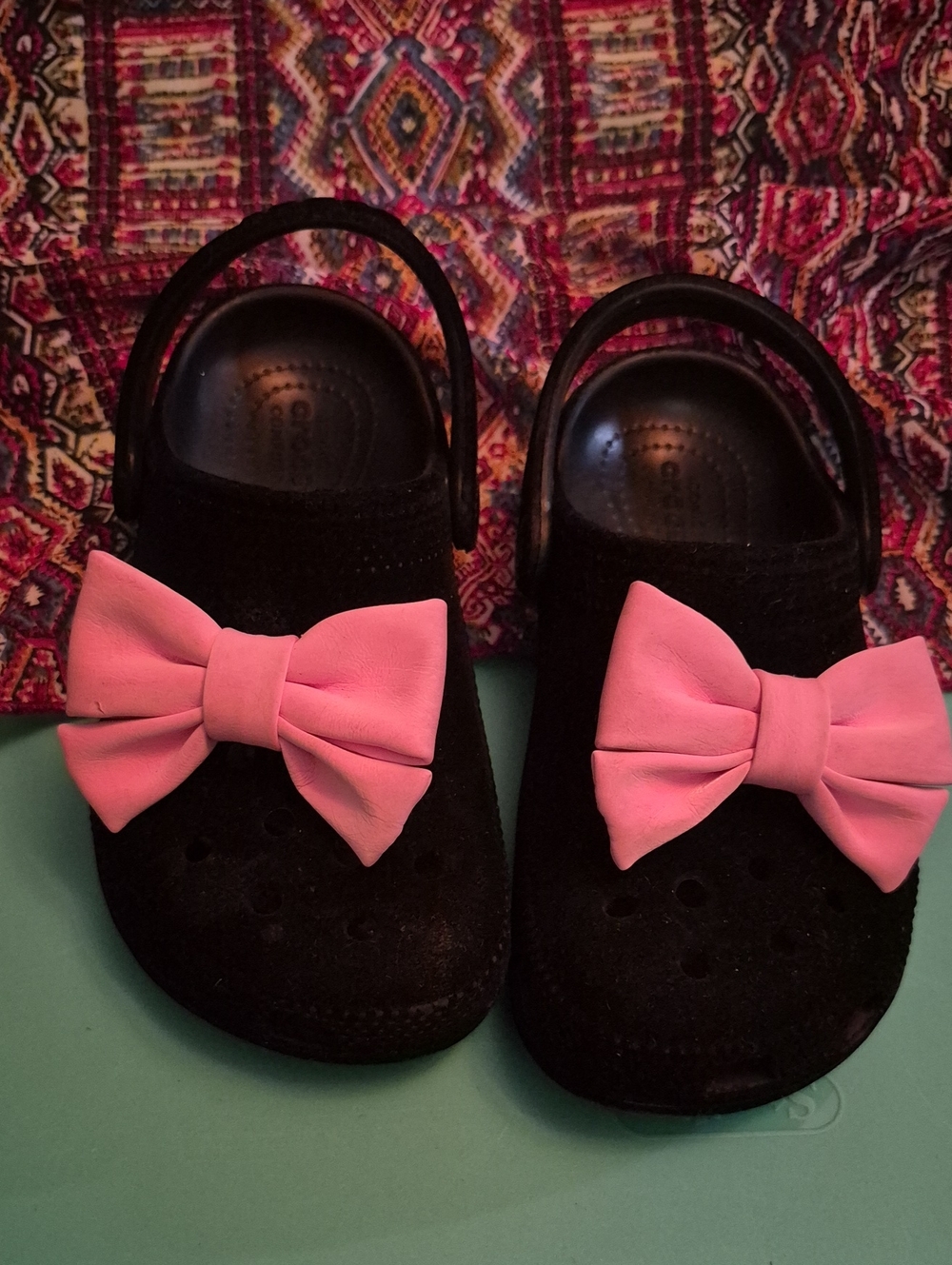 CROCS Kids Black Clogs with Pink Bows